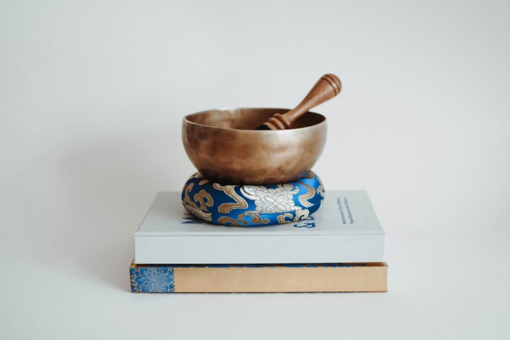 A tranquil meditation space arranged with sound healing instruments for deep mental relaxation