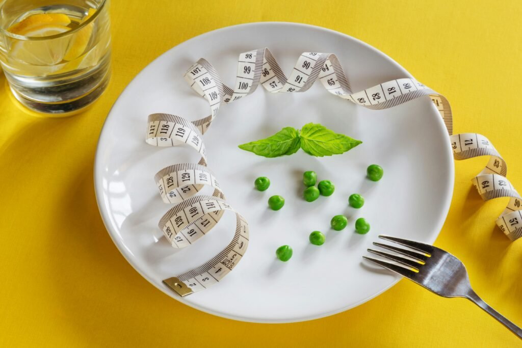 A balanced light breakfast plate with lean protein and fresh greens