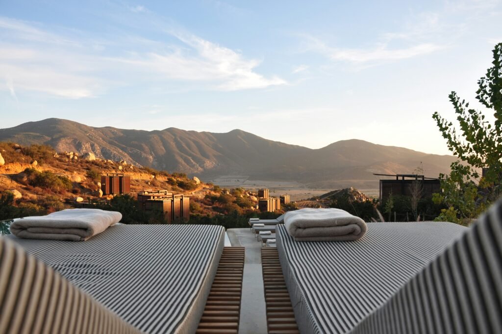 A tranquil morning sound meditation setting with brass singing bowls in a wellness suite
