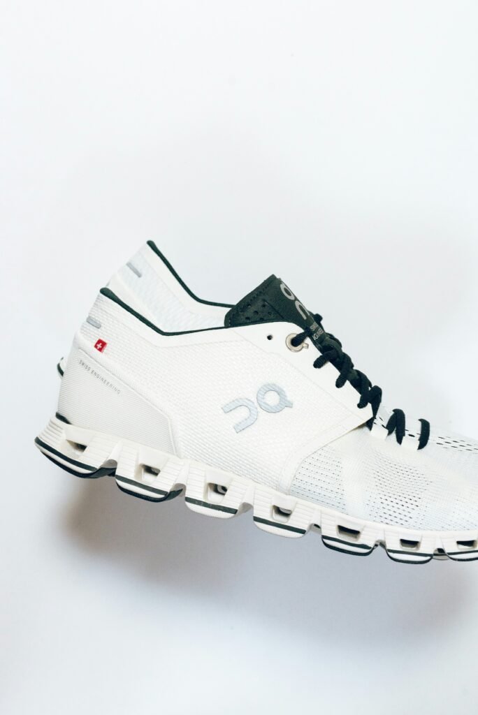 A selection of athletic performance footwear designed for running, lifting, and daily walking